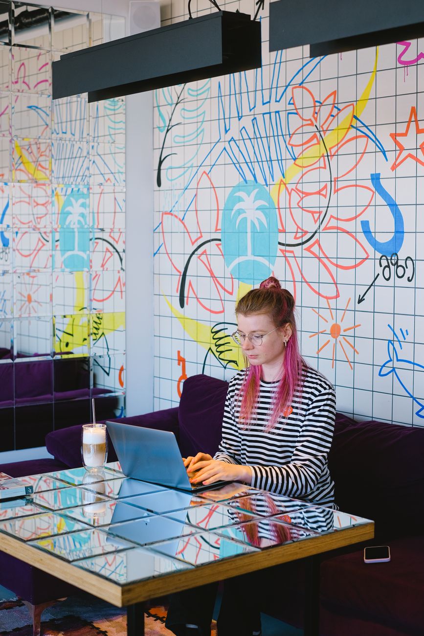 woman hotel laptop business