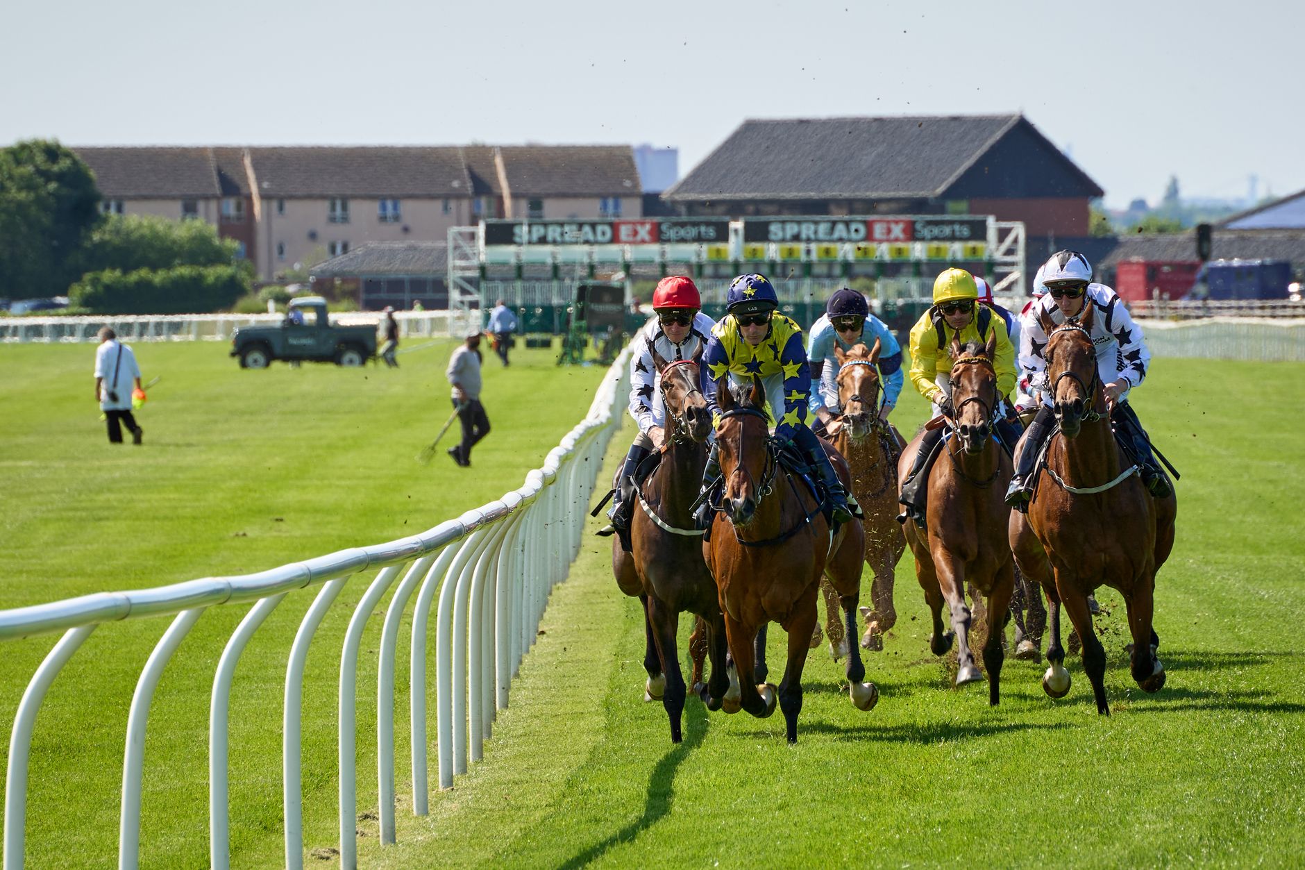 exciting horse racing event with jockeys in action