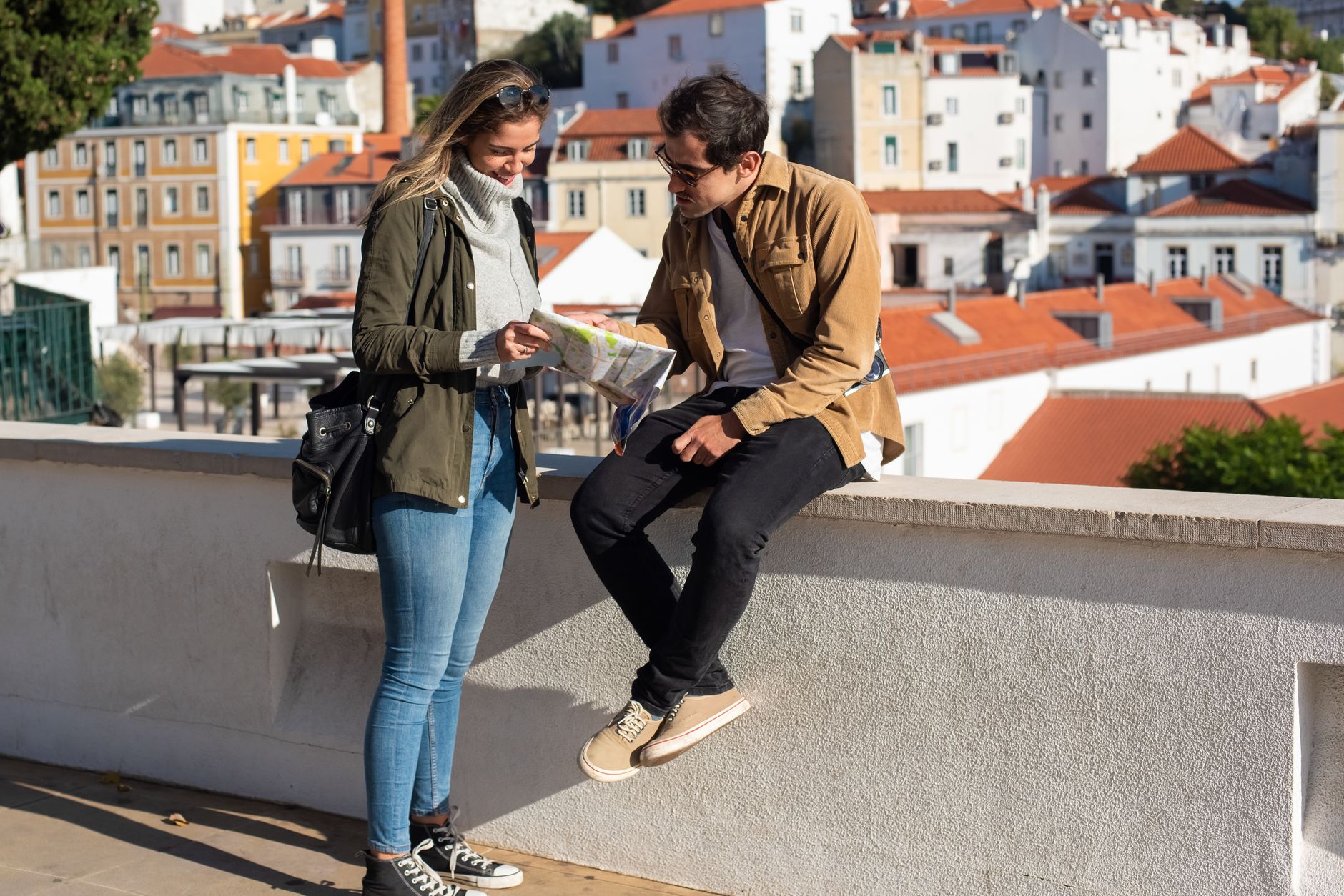 a couple looking at the map